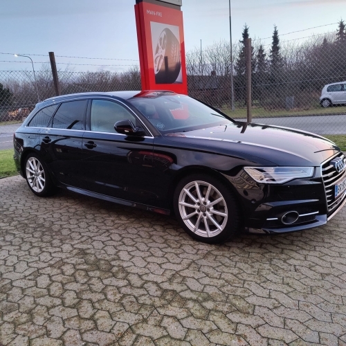 Sort Audi med keramisk coating som giver dyb glans og beskyttelse
